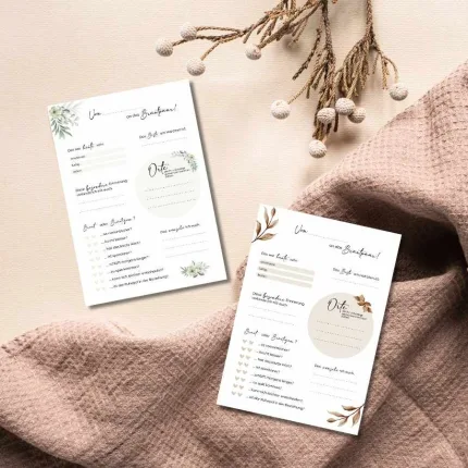 Zwei Hochzeitsfragebögen "Meine Hochzeit" nebeneinander liegend