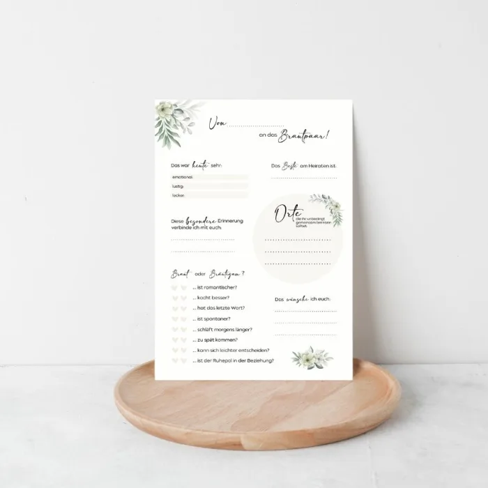 Hochzeitsfragebogen "Meine Hochzeit" auf Tischuntersetzer vor weißer Wand